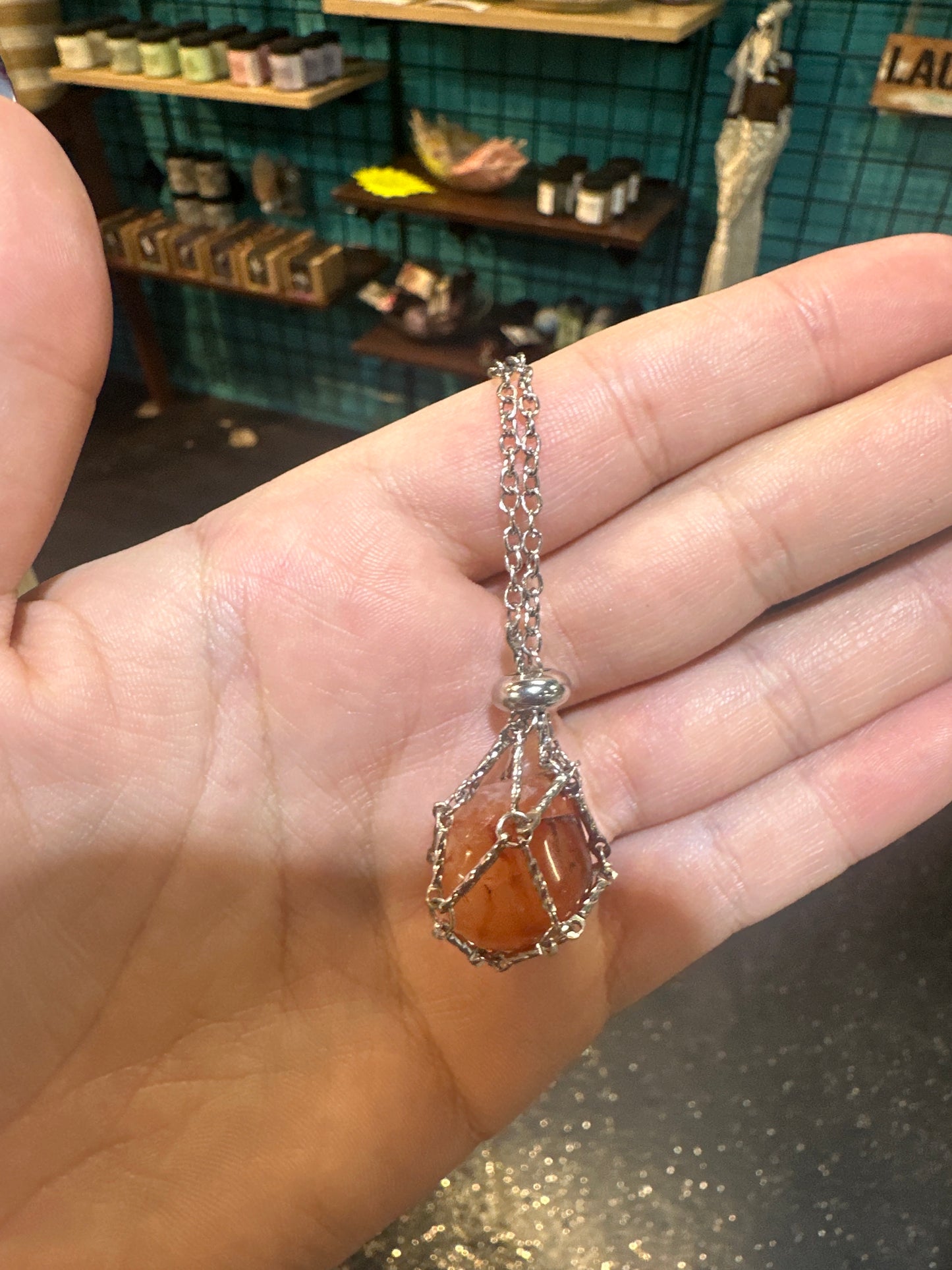 Silver chain cage necklace