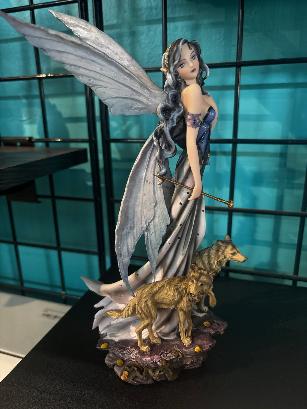 Fairy with wolves statue