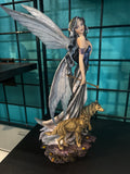 Fairy with wolves statue