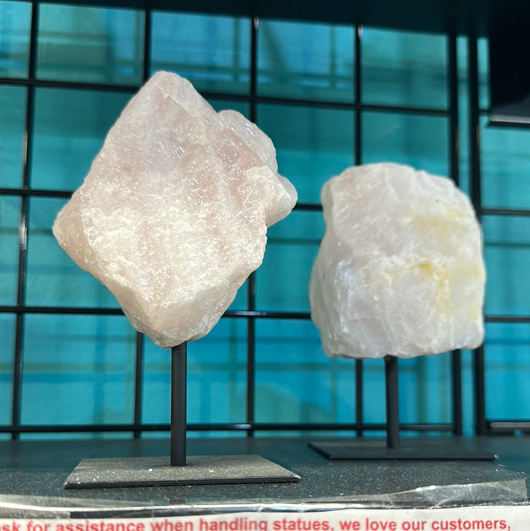 Raw Rose Quartz chunk with stand